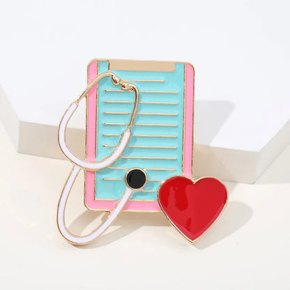 Heart-Shaped Medical Brooch Pin - Stethoscope, Electrocardiogram, and Microscope Design for Nurses and Doctors - Perfect Lapel Jewelry for Backpacks